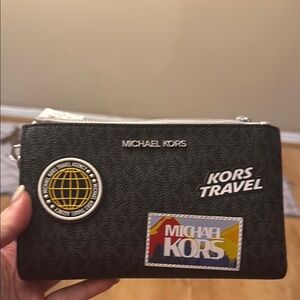 Michael Kors Black Wallet with Travel-Themed Patches